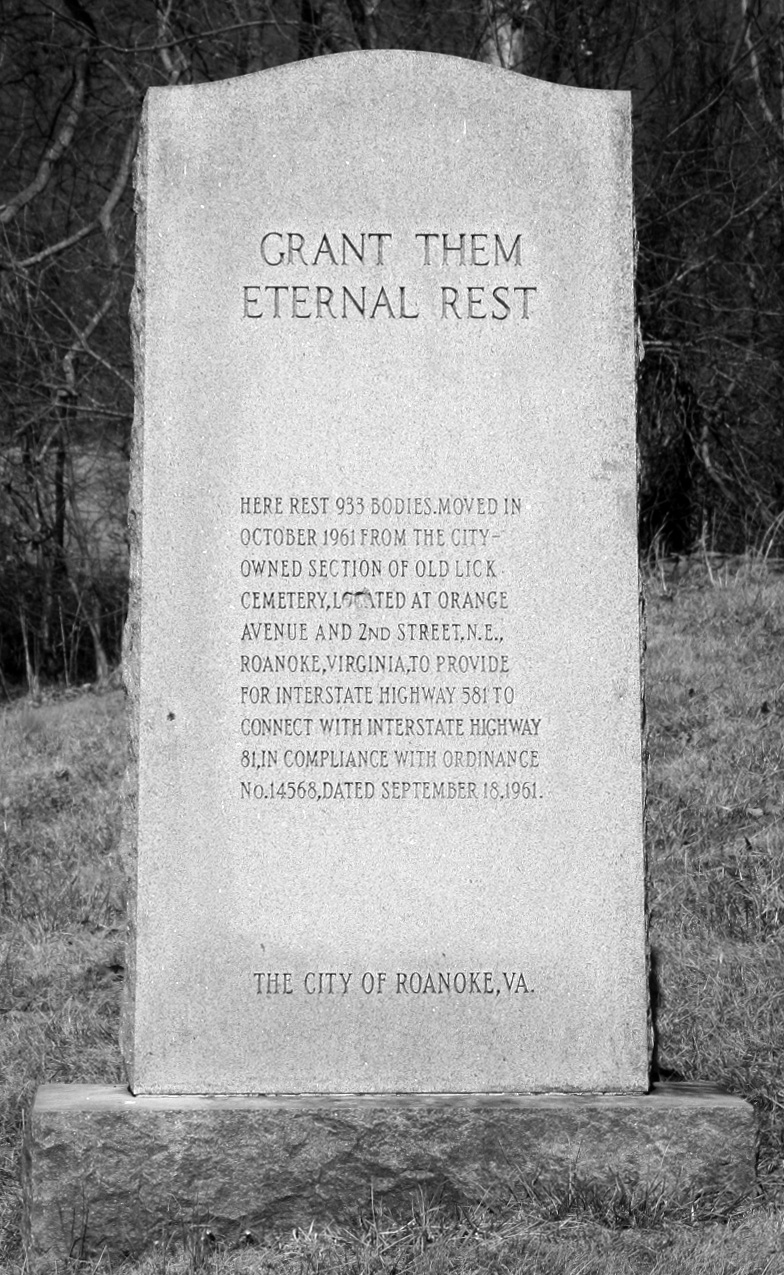 Photo of a mass grave marker in Botetourt County. In large text it says, "Grant them eternal rest"