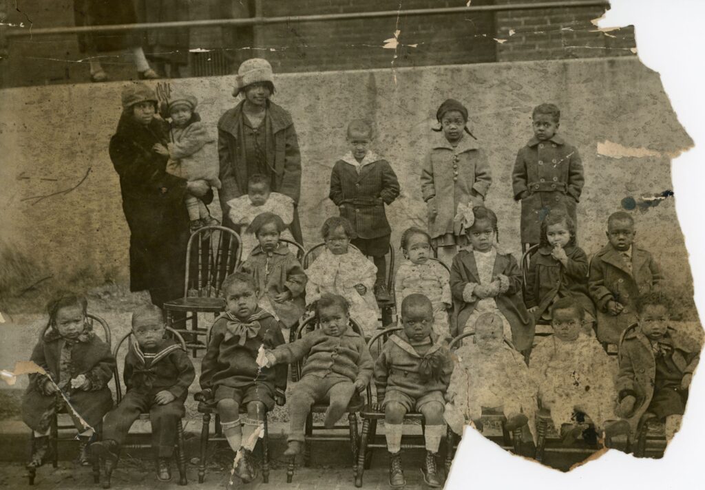 Old photo of bible school attendants out front of the church