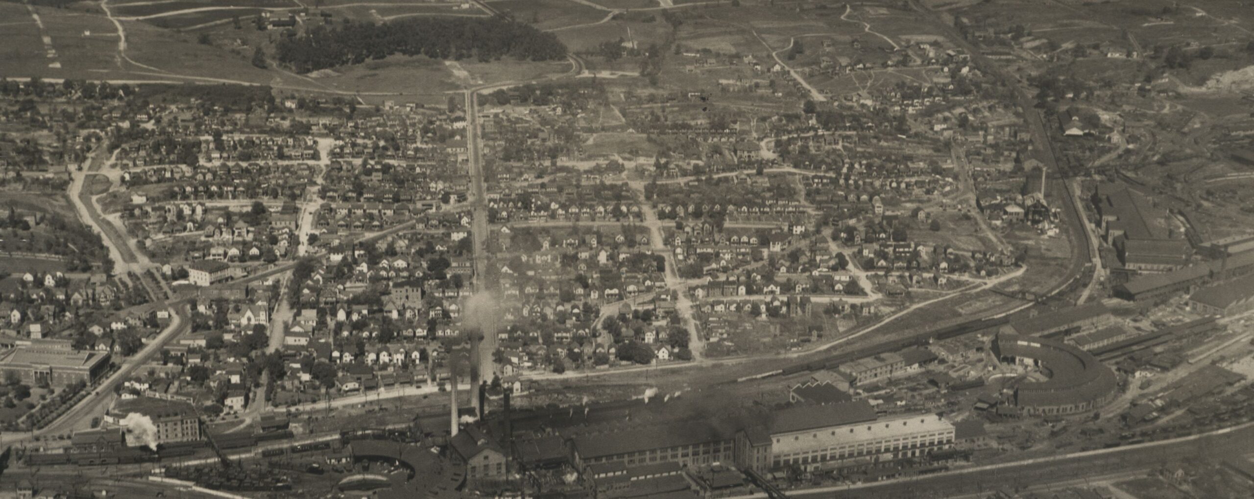 A high up photo of Northeast Roanoke where you can see the railway and machine shop